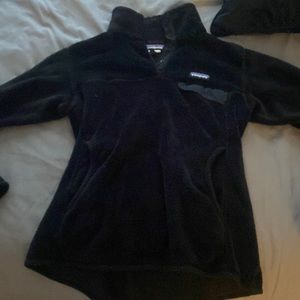 Black Patagonia crew neck with pockets lightly worn